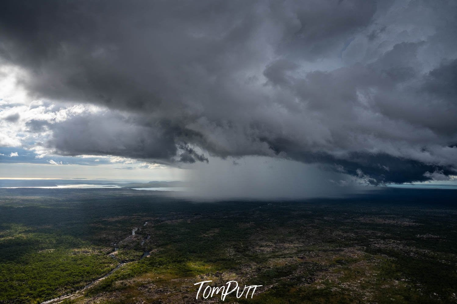 Giant clouds over a sea, creating a sea storm, Wet Season Downpour, The Kimberley